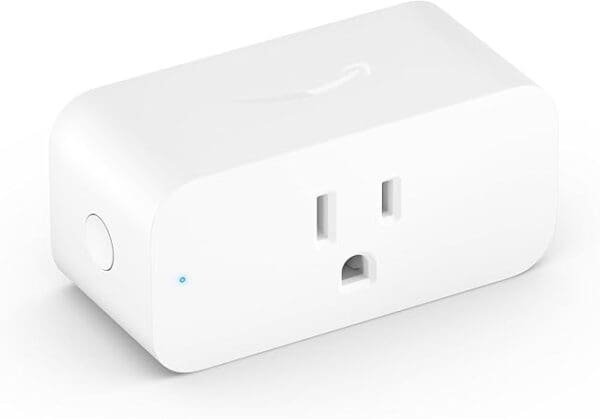 A white box with an outlet on top of it.