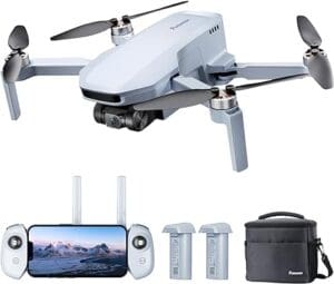 A white and silver drone with accessories.